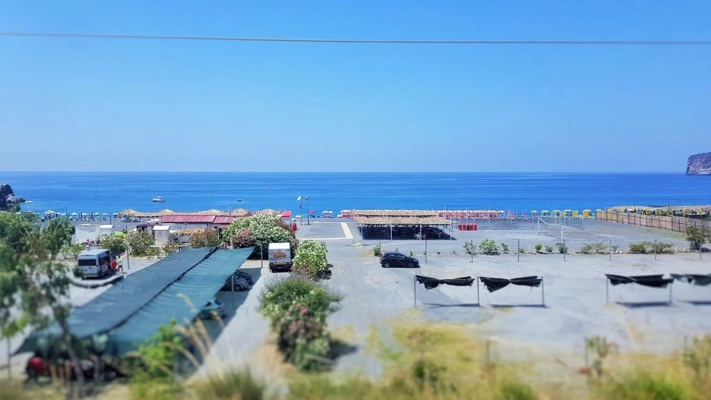 One of dozens of beach resorts that can be seen from the train heading south to Sicily