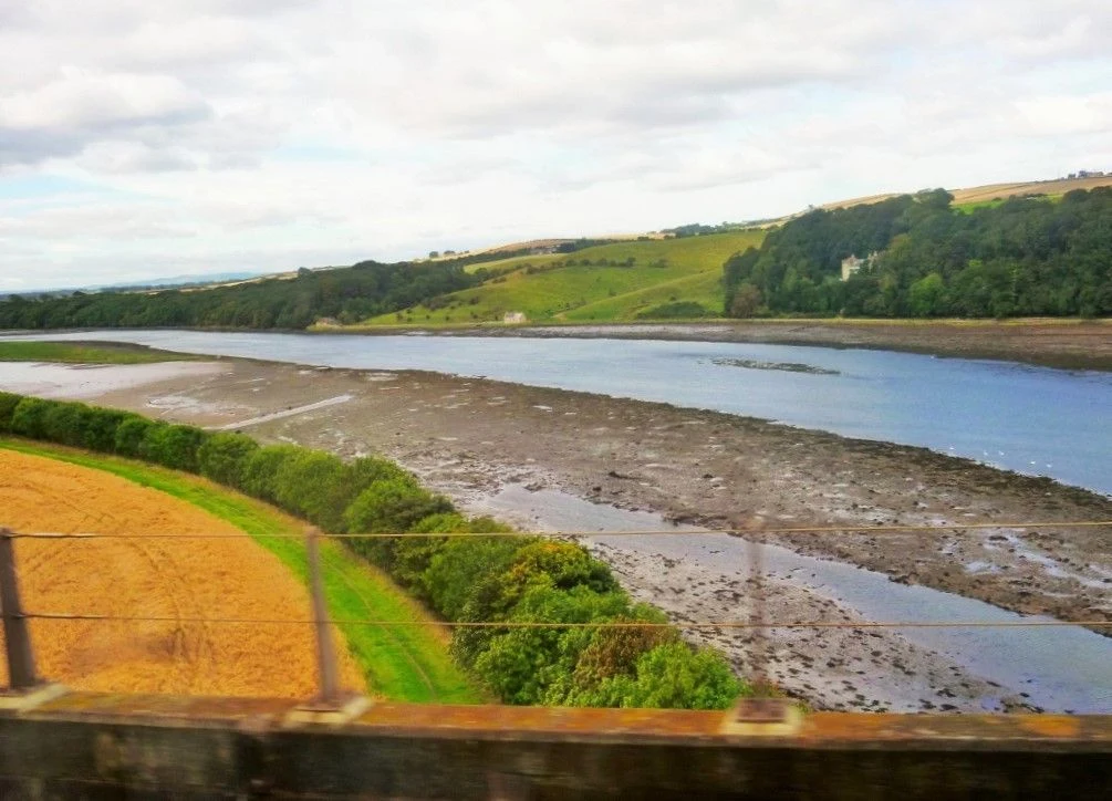 Between Berwick and Dunbar on a train heading to Edinburgh