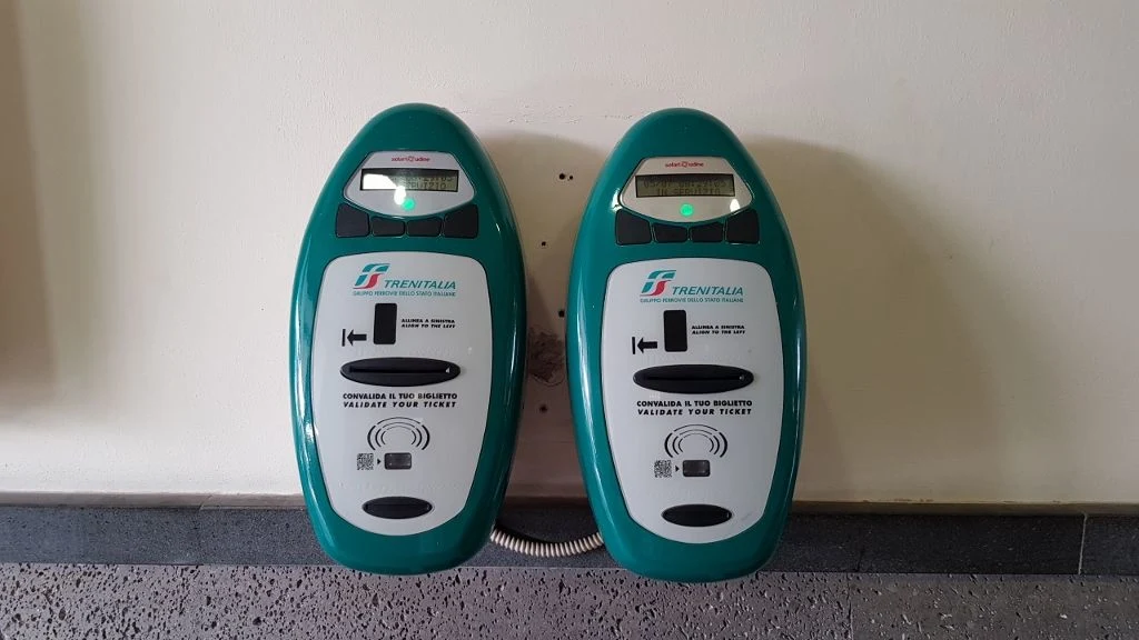 Two ticket stamping machines of the type found at Italian stations