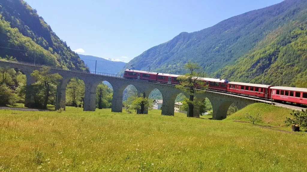 Travelling over the Brusio Spiral Viaduct on the Bernina Railway