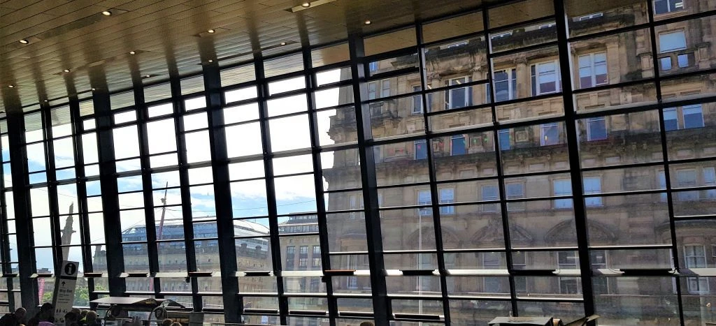 George Square on the left can be seen from within Queen Street station