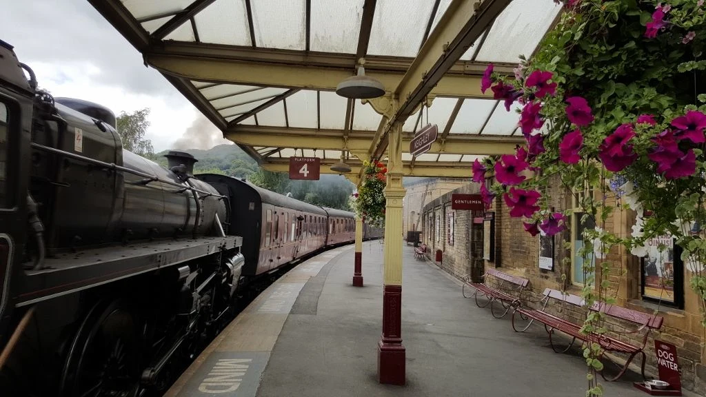 A steam train arrives in Keighley