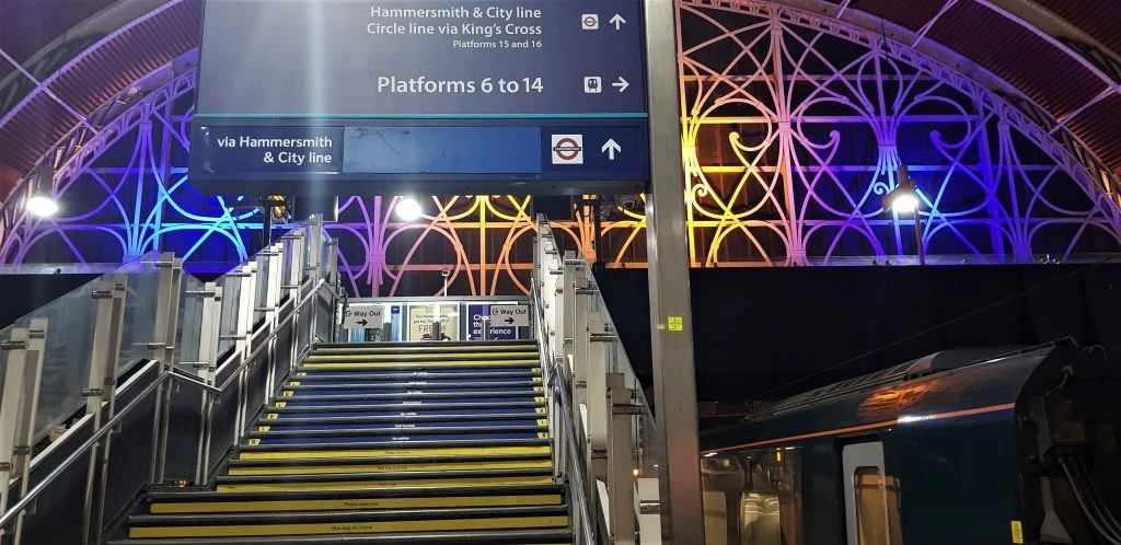 Using the stairs to access the Hammersmith and City line at Paddington station